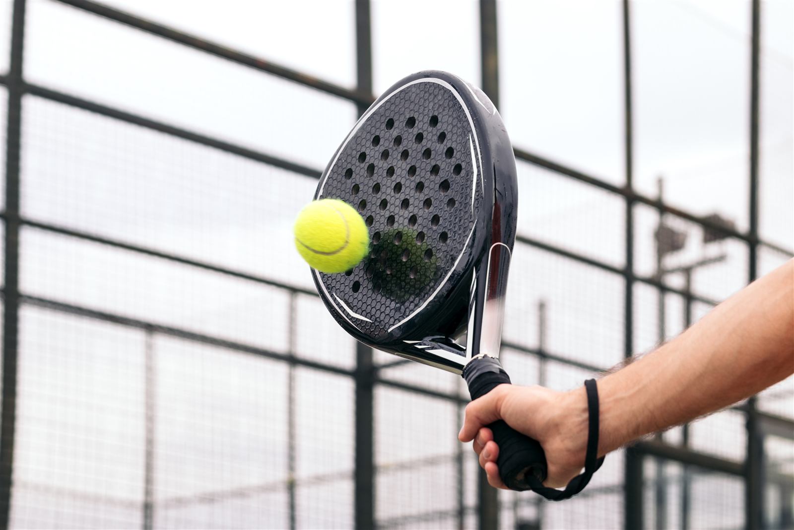Racket meeting the ball